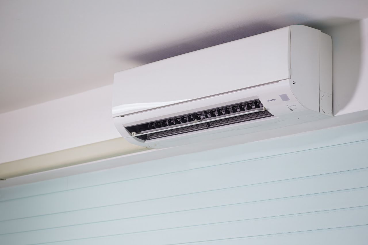 Mastering the First Impression: Your intriguing post title goes here Close-up of a wall-mounted air conditioner indoors, showcasing sleek design for modern cooling solutions.